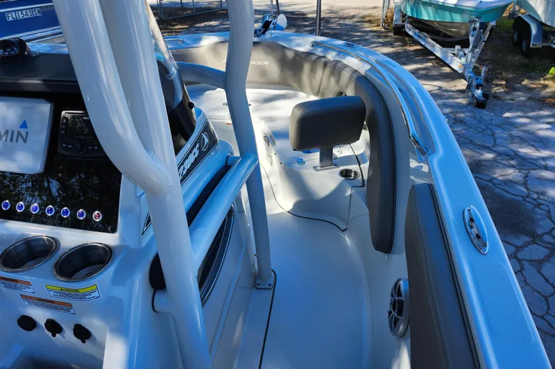 Slide: The Image of 2022 Finseeker 230 CC boat interior with console and seating area. - 43