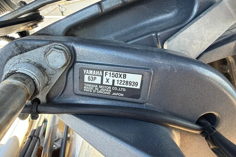 Slide: The Image of Yamaha F150XB engine label on 2002 Cobia 191 Bay boat. - 16