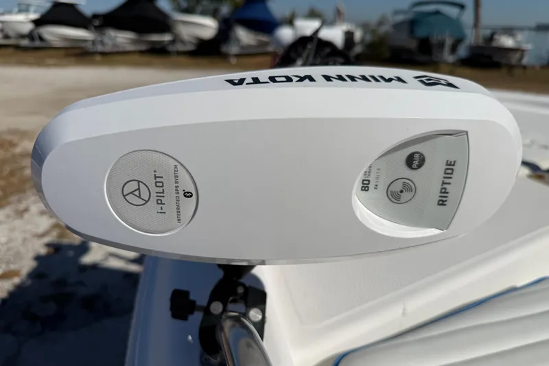 Slide: The Image of Minn Kota Riptide trolling motor on 2002 Cobia 191 Bay boat, featuring i-Pilot GPS system. - 41
