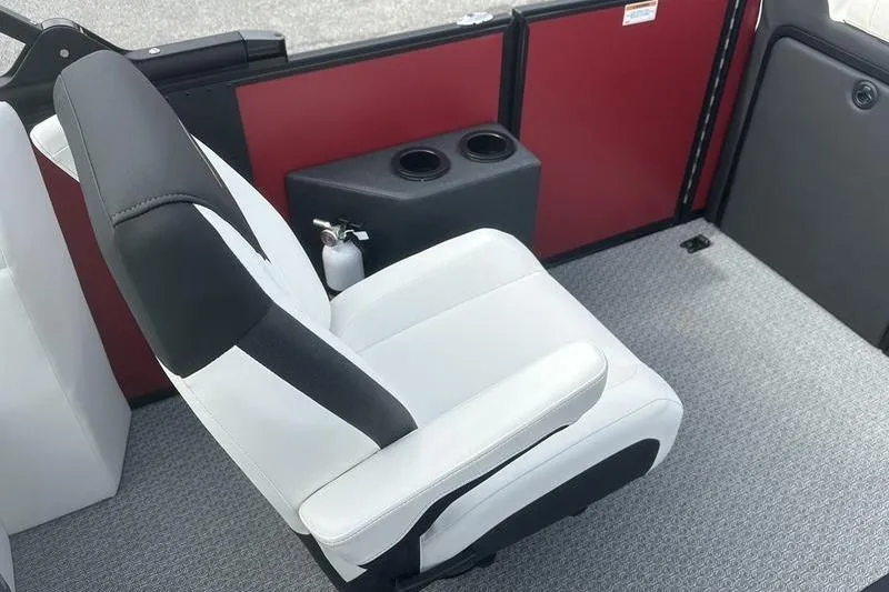 Slide: The Image of White and black seat in 2026 Evotti 521CS boat interior with cup holders. - 19