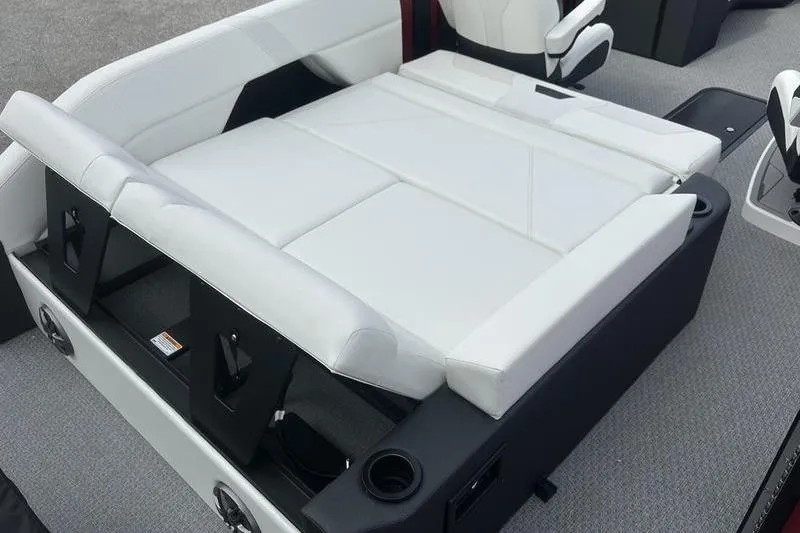 Slide: The Image of Luxurious white seating in 2026 Evotti 521CS boat interior, featuring cup holders and modern design. - 21