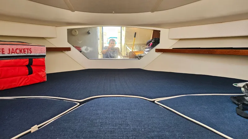Slide: The Image of Interior of 2006 Tiara Yachts 2900 Coronet with life jackets. - 18