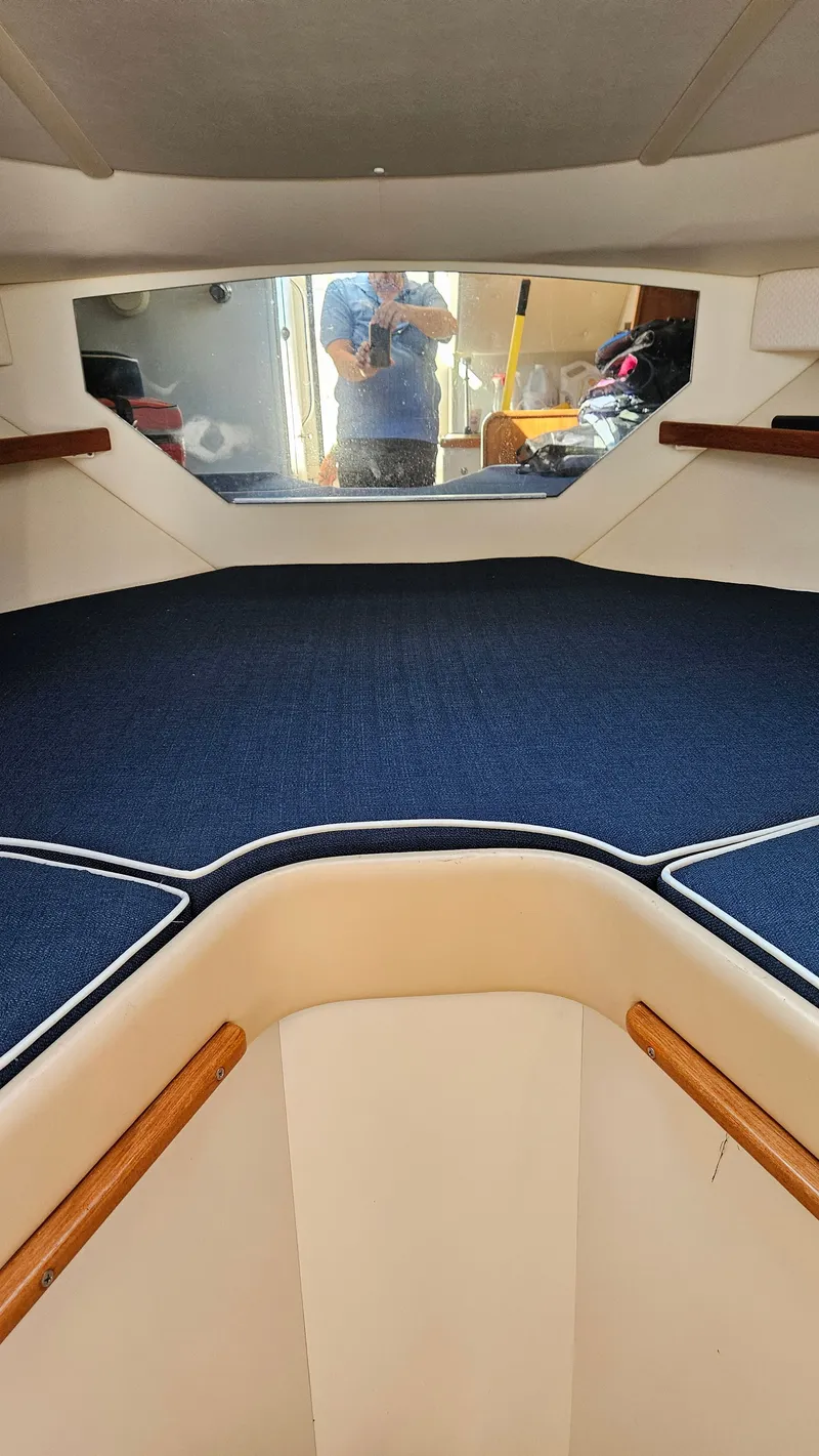Slide: The Image of Interior of 2006 Tiara Yachts 2900 Coronet with blue upholstery. - 3