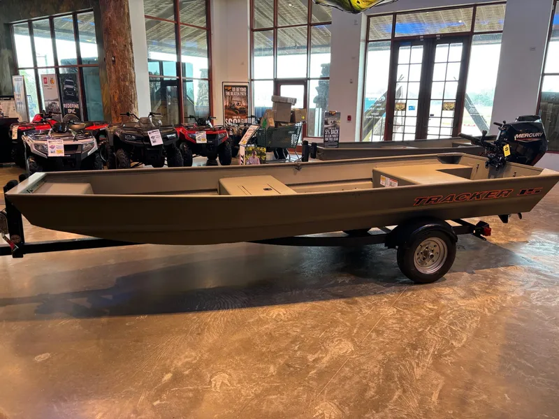 Slide: The Image of 2025 Tracker Grizzly 1542 Utility boat on display in showroom. - 5