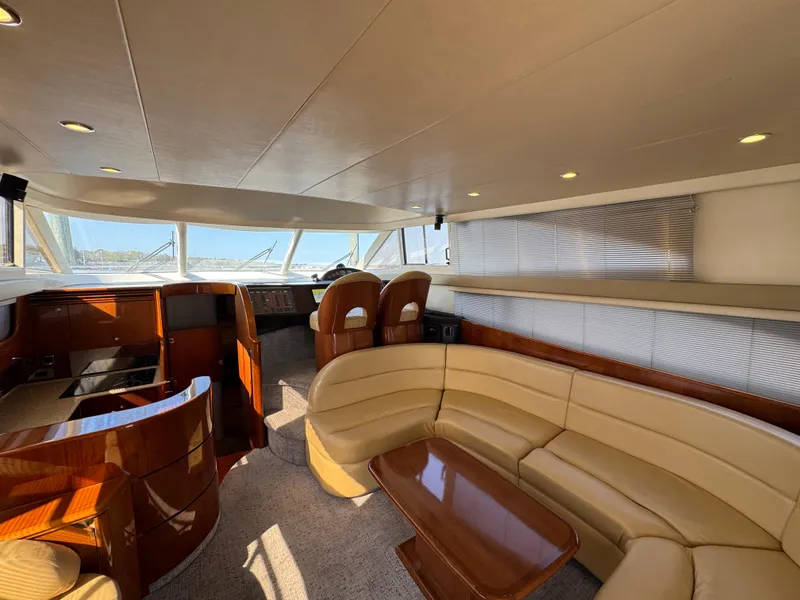 Slide: The Image of Luxurious interior of 2005 Viking Princess 50 Flybridge yacht with leather seating and wood finishes. - 10