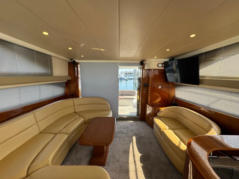 Slide: The Image of Luxurious interior of 2005 Viking Princess 50 Flybridge yacht with elegant seating and modern amenities. - 13