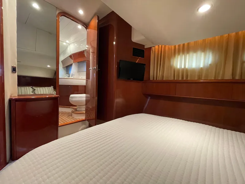 Slide: The Image of Luxurious cabin interior of 2005 Viking Princess 50 Flybridge yacht with ensuite bathroom. - 22