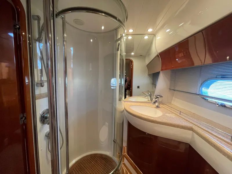 Slide: The Image of Luxurious bathroom in 2005 Viking Princess 50 Flybridge yacht with modern shower and elegant fixtures. - 24