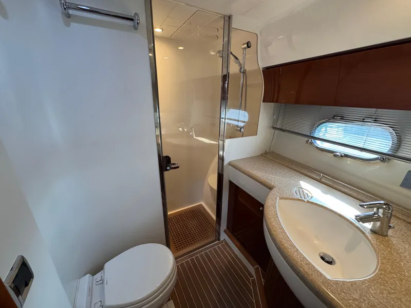 Slide: The Image of Luxurious bathroom in 2005 Viking Princess 50 Flybridge yacht with shower and modern fixtures. - 27