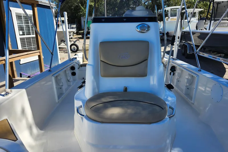 Slide: The Image of 2020 NauticStar 195 NauticBay boat interior with seating and console. - 14
