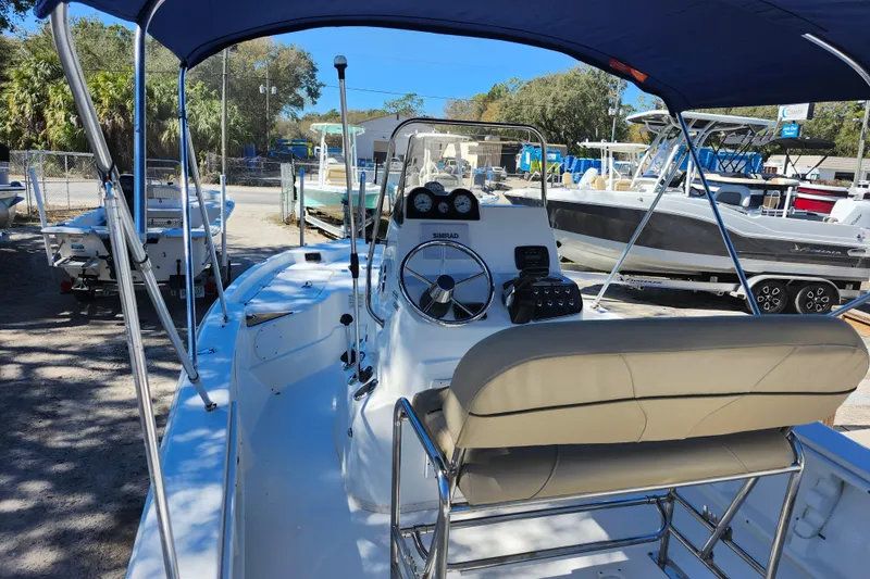 Slide: The Image of 2020 NauticStar 195 NauticBay boat interior with steering console and seating. - 29