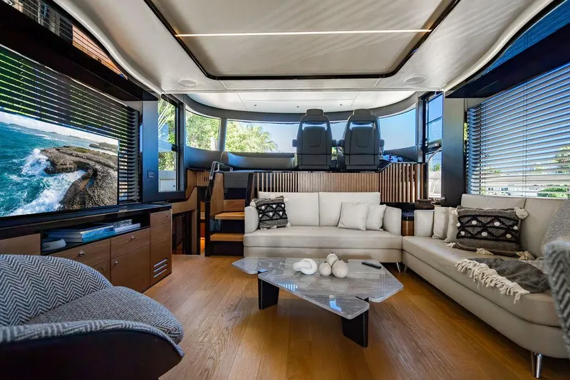 Slide: The Image of Luxurious interior of 2023 Absolute 64 Navetta yacht with modern furnishings and scenic views. - 10