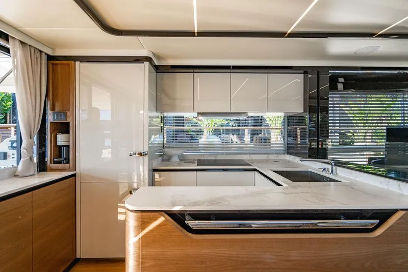 Slide: The Image of Luxurious kitchen interior of 2023 Absolute 64 Navetta yacht with modern design. - 14