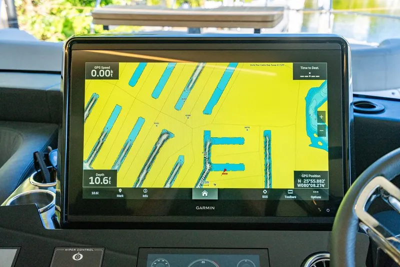 Slide: The Image of Garmin navigation display on 2023 Absolute 64 Navetta yacht dashboard. - 21