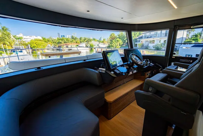 Slide: The Image of Luxurious interior of 2023 Absolute 64 Navetta yacht with modern navigation equipment. - 3