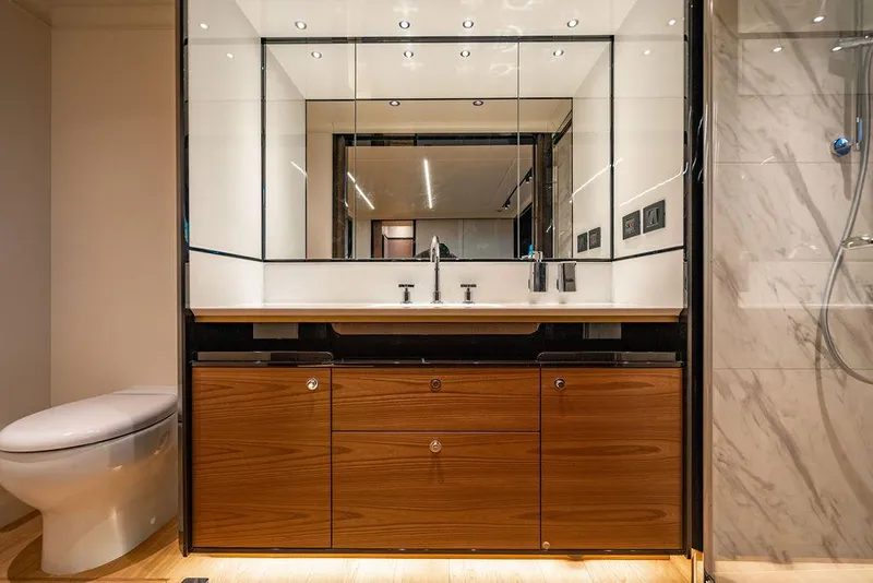 Slide: The Image of Luxurious bathroom in 2023 Absolute 64 Navetta yacht with modern fixtures and elegant design. - 36