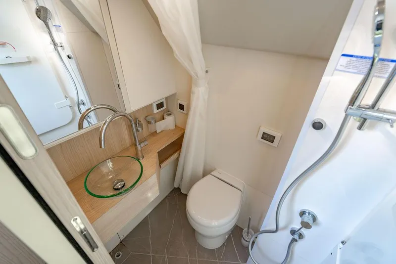 Slide: The Image of Luxurious bathroom in 2023 Absolute 64 Navetta yacht with modern fixtures. - 43