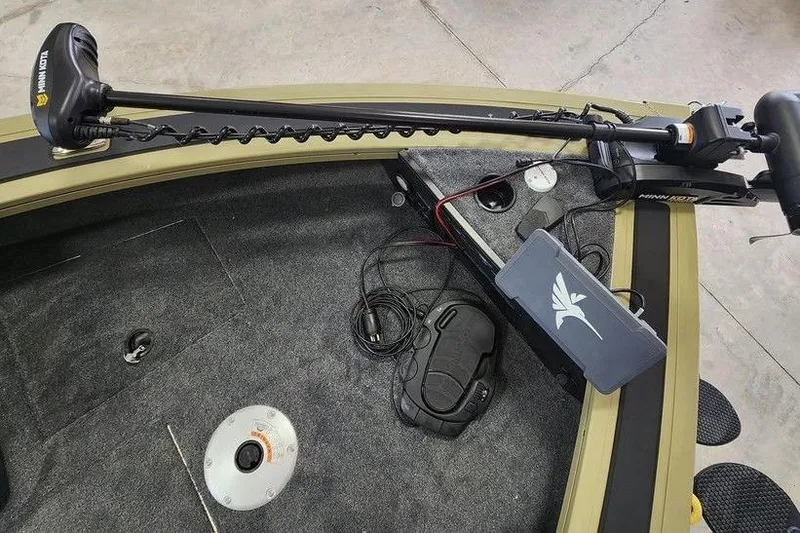 Slide: The Image of 2026 Tracker Targa 185 WT boat interior with Minn Kota trolling motor and accessories. - 8