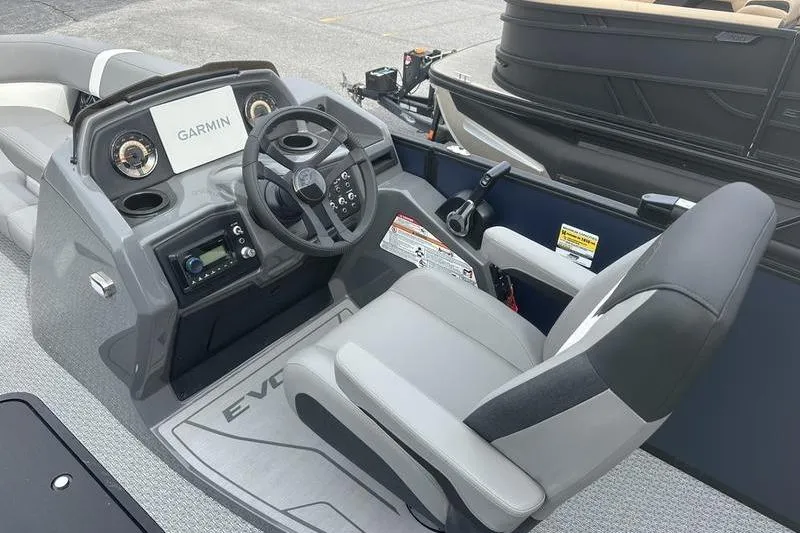 Slide: The Image of Interior of 2026 Evotti 523CS boat with Garmin navigation system and modern steering console. - 11