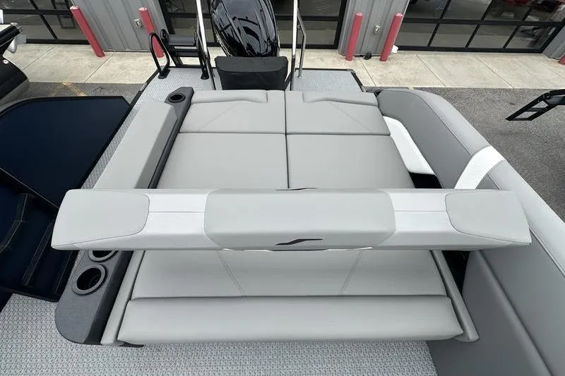 Slide: The Image of 2026 Evotti 523CS boat with gray seating and cup holders, viewed from above. - 21