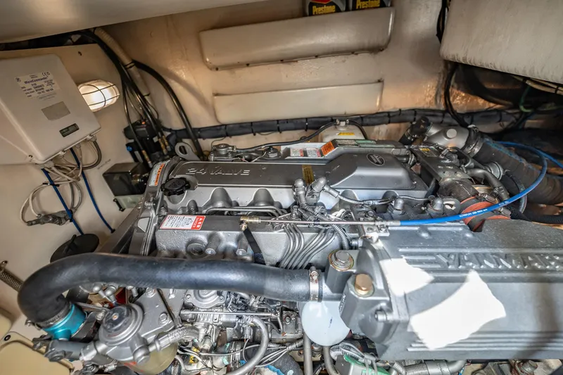 Slide: The Image of Engine room of 2004 Luhrs 32 Open boat, featuring a Yanmar 24-valve engine. - 45