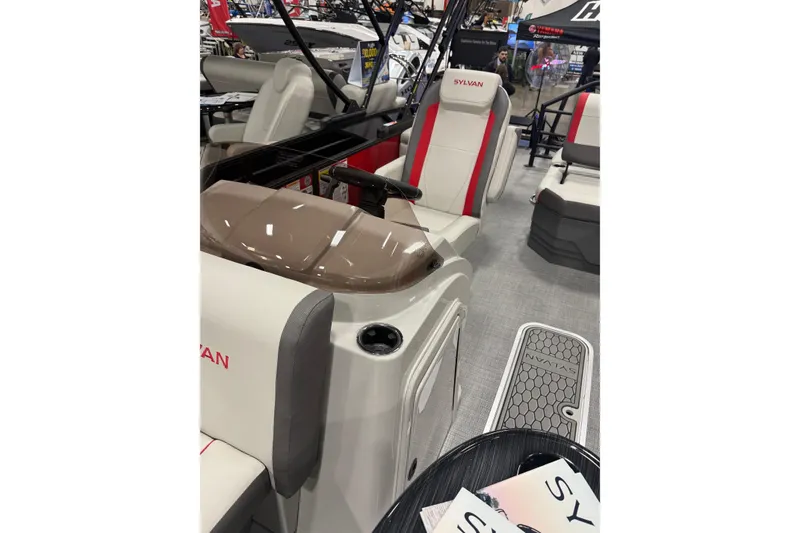 Slide: The Image of 2026 Sylvan Mirage X X1 CLZ DH boat interior with modern seating and controls. - 5