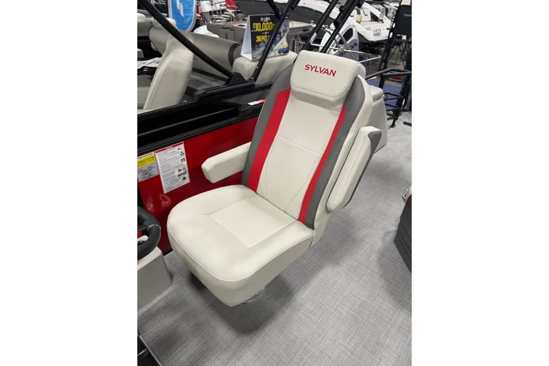 Slide: The Image of 2026 Sylvan Mirage X X1 CLZ DH boat seat with red and gray accents. - 7