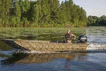 Slide: The Image of Manufacturer Provided Image: 2026 Crestliner 1760 Retriever Jon boat cruising on a lake with lush green trees. - 13