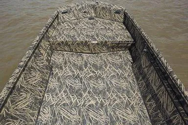 Slide: The Image of Manufacturer Provided Image: 2026 Crestliner 1760 Retriever Jon boat with camouflage interior on water. - 15