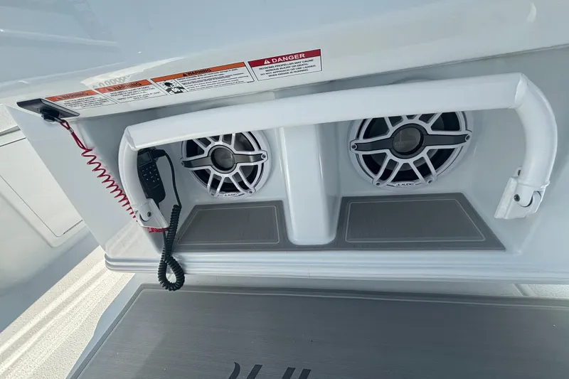Slide: The Image of 2026 Yellowfin 36 Offshore boat speakers and radio handset detail. - 23