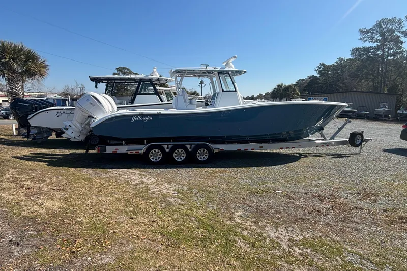 Slide: The Image of 2026 Yellowfin 36 Offshore boat on trailer in outdoor setting. - 3