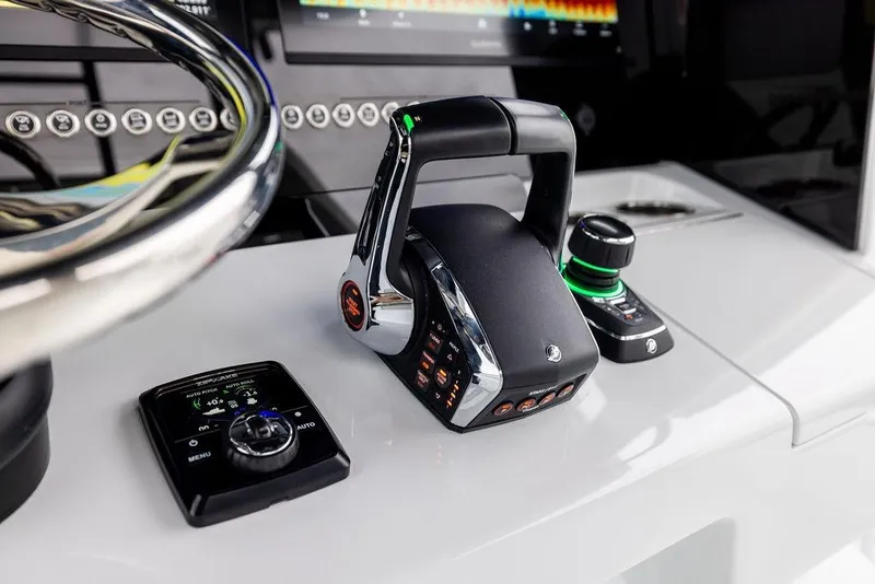 Slide: The Image of Control panel of 2025 Freeman 38 boat with advanced navigation technology. - 16