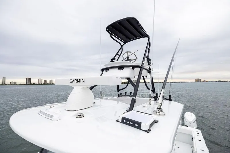 Slide: The Image of 2025 Freeman 38 boat with Garmin equipment on open water. - 25