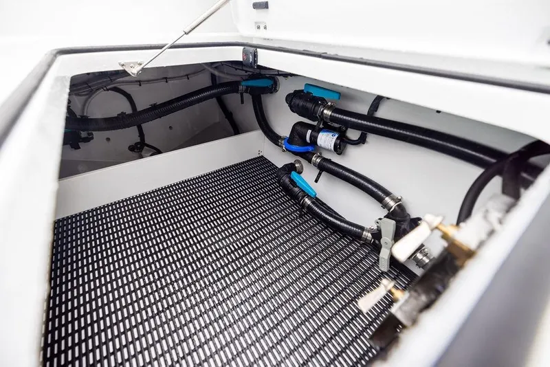 Slide: The Image of Interior view of Freeman 38 (2025) boat compartment with hoses and fittings. - 36