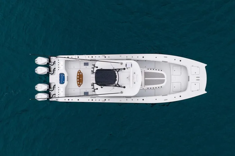 Slide: The Image of Top view of 2025 Freeman 38 boat on blue water. - 5