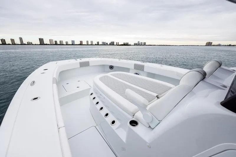 Slide: The Image of Luxurious 2025 Freeman 38 boat interior with ocean view and city skyline. - 9