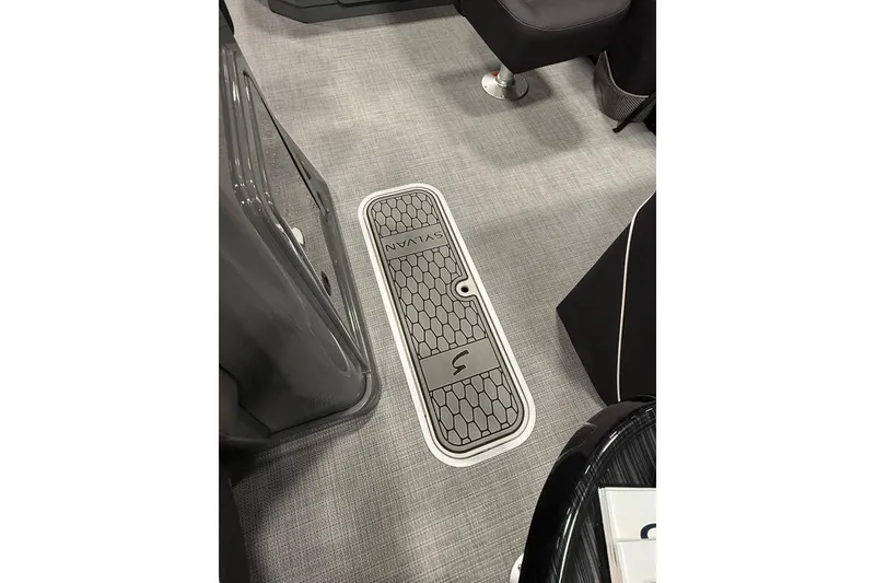 Slide: The Image of 2026 Sylvan Mirage X X3 CLZ DH interior flooring with stylish design and logo. - 11