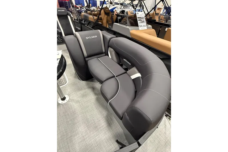 Slide: The Image of 2026 Sylvan Mirage X X3 CLZ DH boat interior with sleek gray seating. - 12
