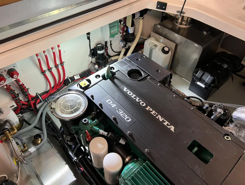 Slide: The Image of Engine compartment of a 2024 Sargo 28 boat with Volvo Penta D4-320 engine. - 29
