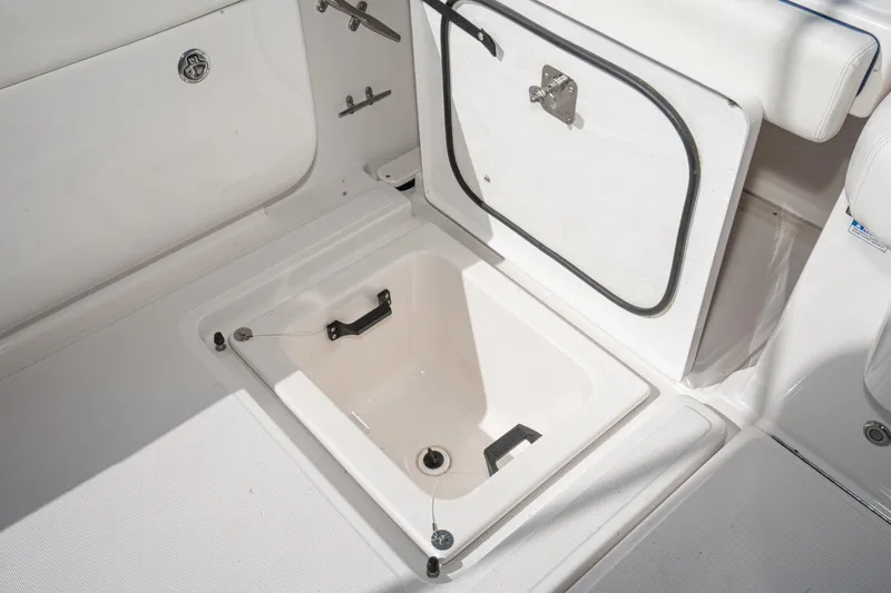 Slide: The Image of Open storage compartment on a 2005 Tiara Yachts 3600 Open. - 14