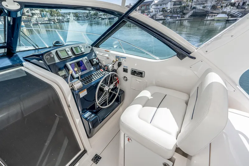 Slide: The Image of Interior of 2005 Tiara Yachts 3600 Open with helm station. - 24