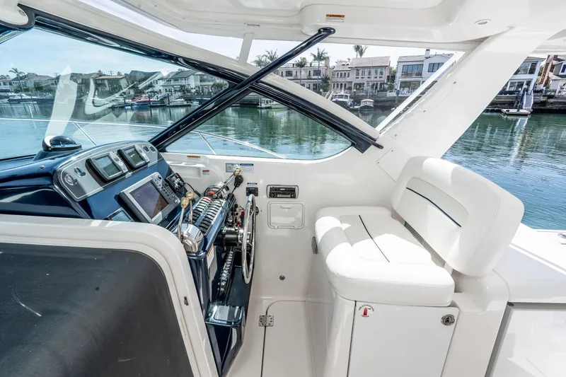 Slide: The Image of Interior of a 2005 Tiara Yachts 3600 Open with helm station. - 25