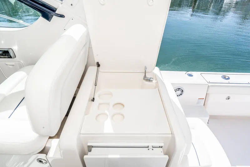 Slide: The Image of Interior of 2005 Tiara Yachts 3600 Open with seating and storage. - 28