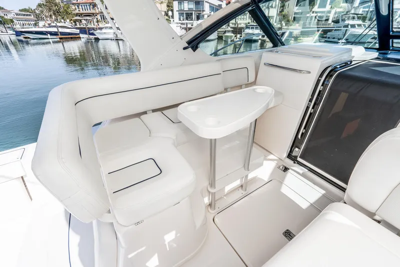 Slide: The Image of Interior of 2005 Tiara Yachts 3600 Open with white seating area. - 31