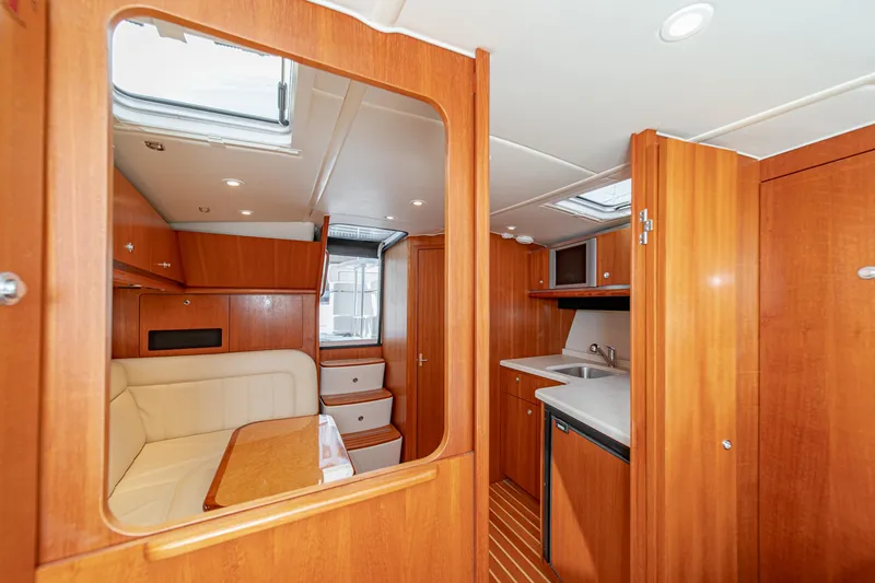 Slide: The Image of Interior of 2005 Tiara Yachts 3600 Open with wood finish. - 43