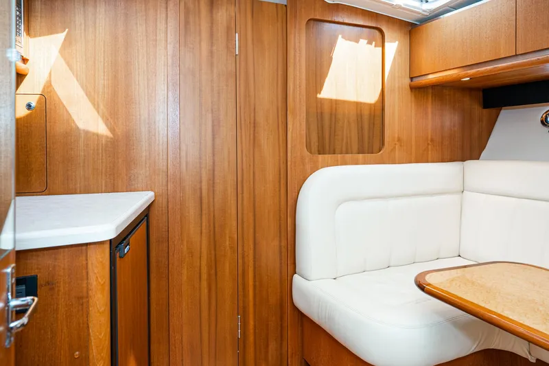 Slide: The Image of Interior of 2005 Tiara Yachts 3600 Open with wood finish. - 44