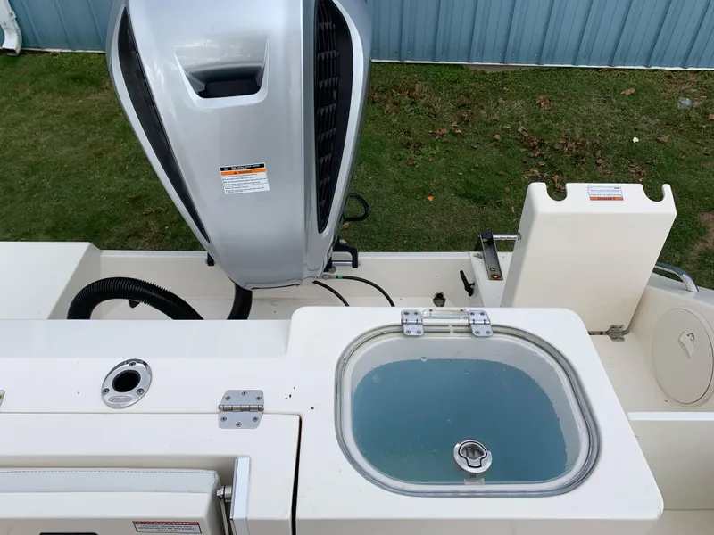 Slide: The Image of Cobia 237 Center Console 2020 with engine and livewell. - 8