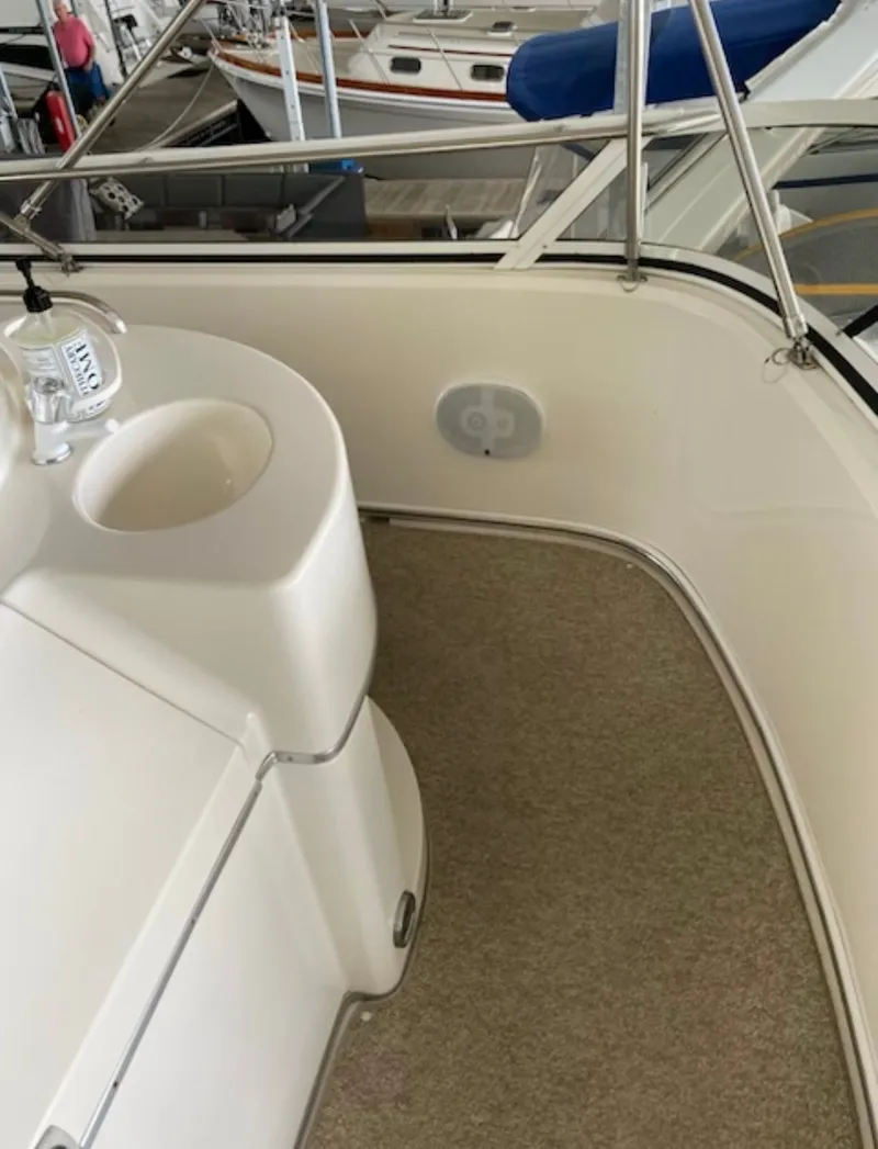 Slide: The Image of Interior of 1996 Sea Ray 440 Express Bridge. - 13