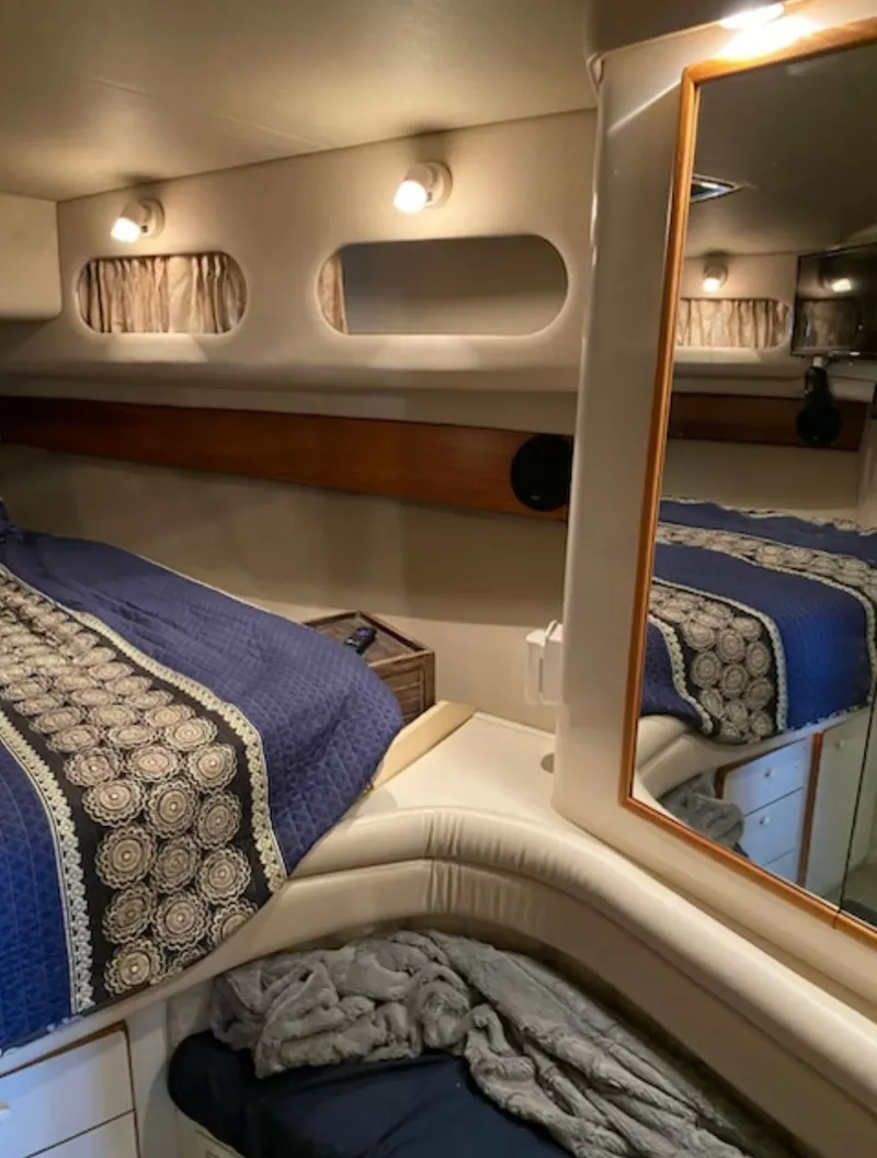 Slide: The Image of Interior of 1996 Sea Ray 440 Express Bridge cabin. - 16