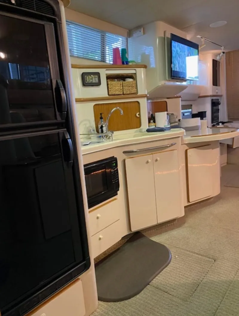 Slide: The Image of Interior of 1996 Sea Ray 440 Express Bridge yacht. - 24